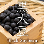 Black soybeans in a wooden container with Chinese characters and 'Black Soybean' text.