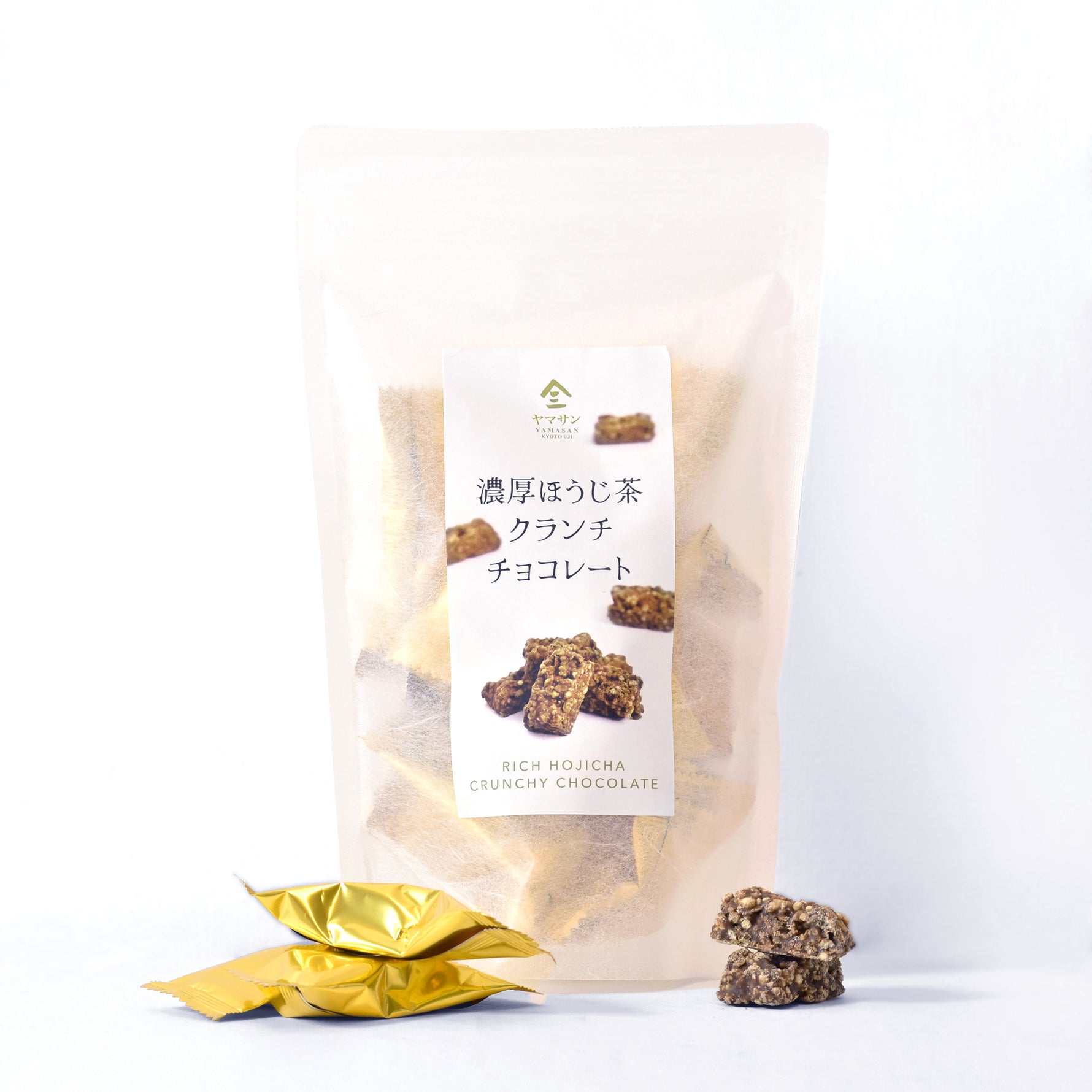 Packaged crunchy chocolate with a label on a white background