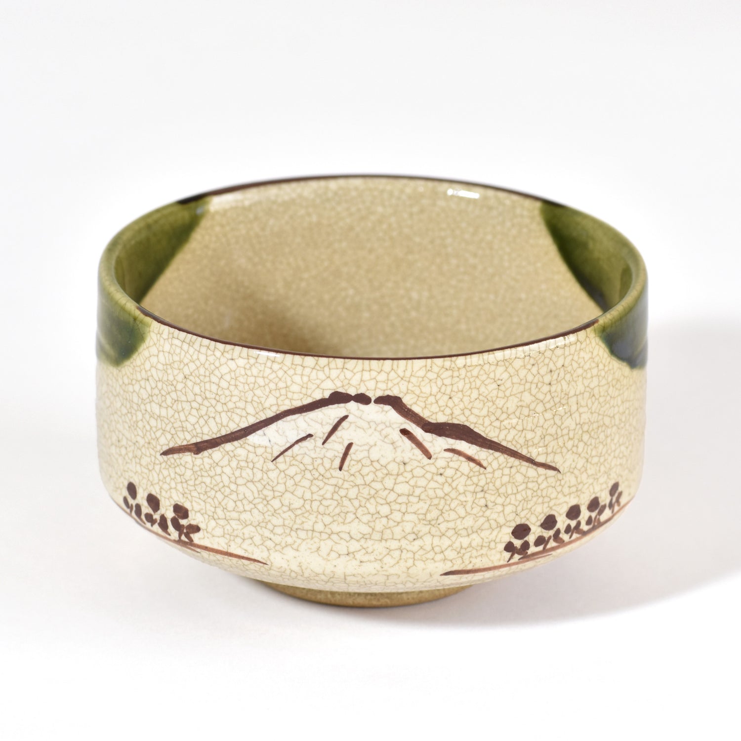 Ceramic bowl with Mount Fuji design on a white background