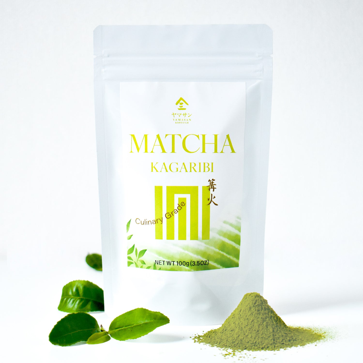 Matcha Kagariibi packaging with matcha powder and leaves on a white background