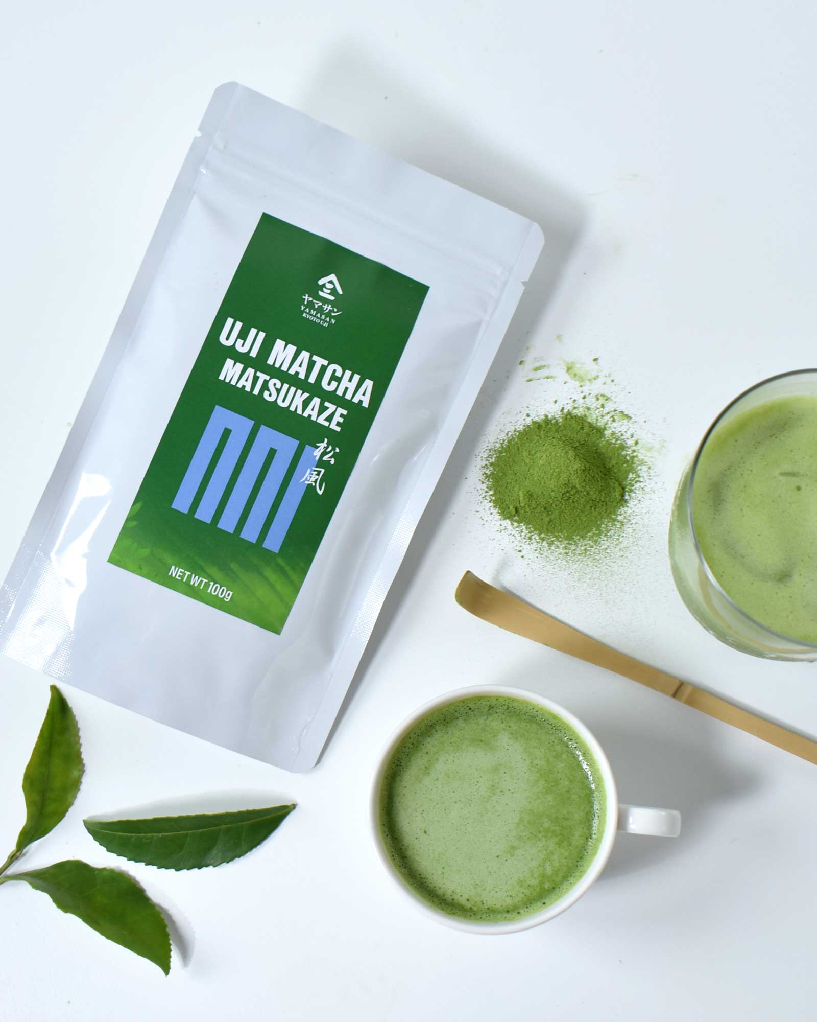 Uji Matcha Matsukaze packaging with two cups of matcha and a spoon on a white background