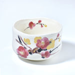 Ceramic bowl with floral design on a white background
