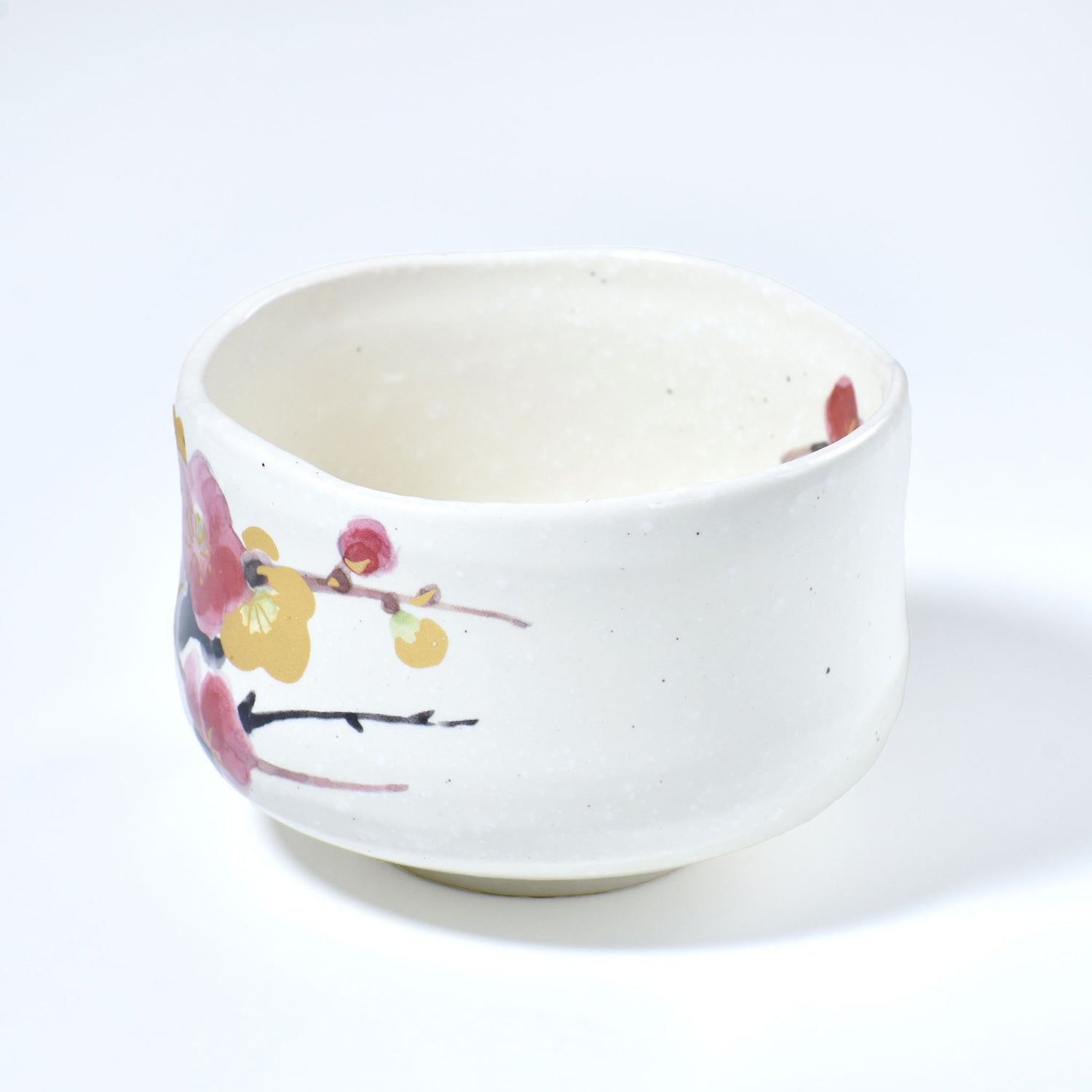Ceramic bowl with floral design on a white background