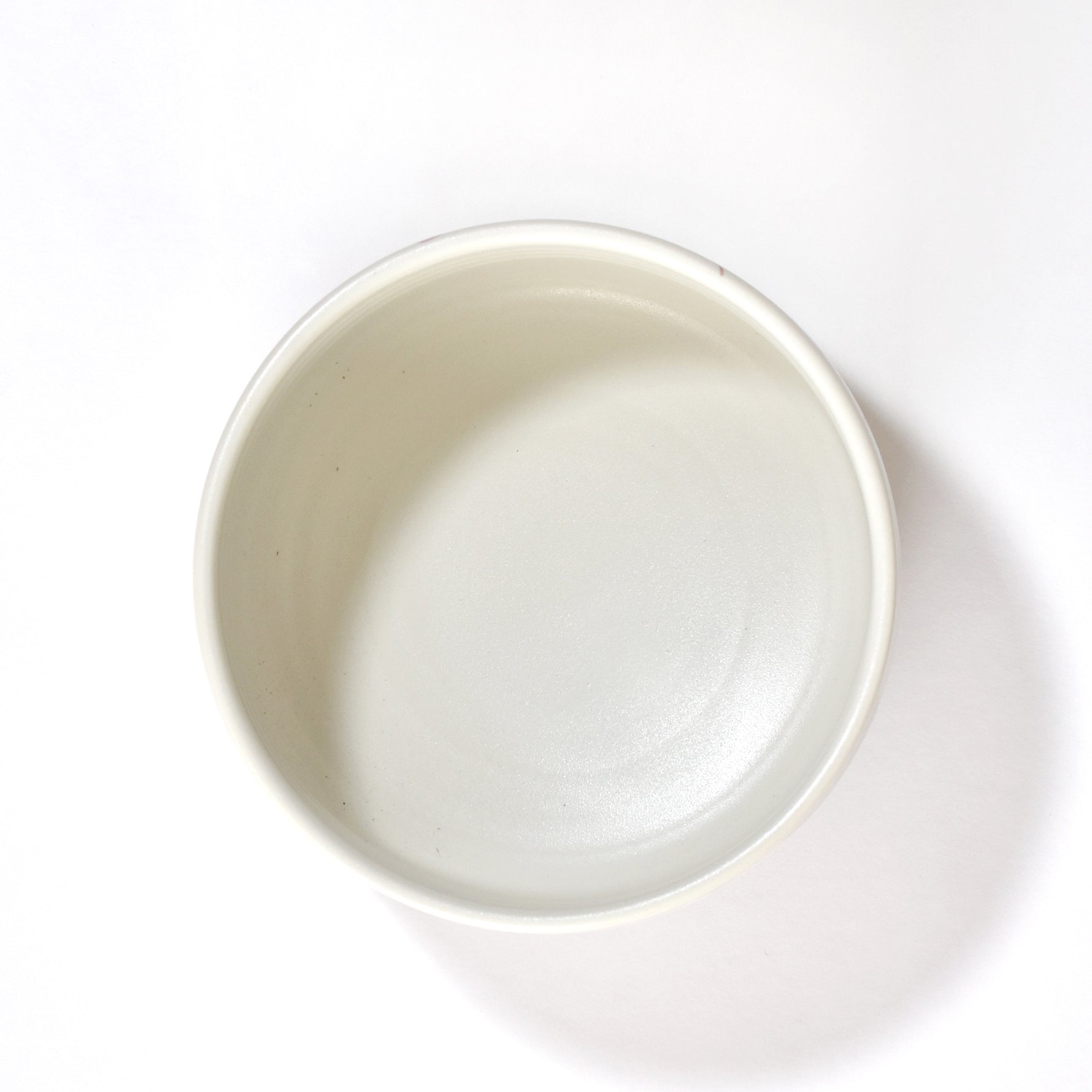 White ceramic bowl on a white background